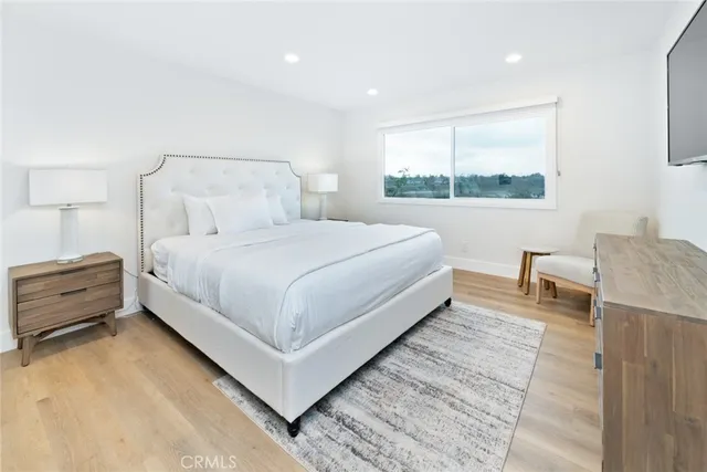 a bathroom with a mirror and a sink