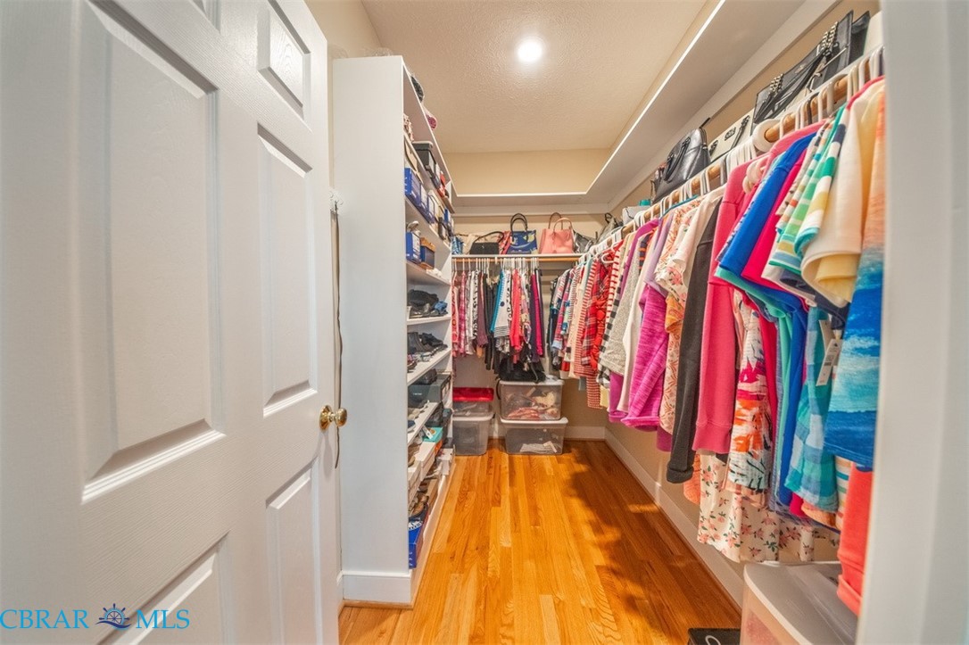 120 North Shore Road Locust Hill, VA 23092 - Photo 20 of 39 Walk in closet featuring light wood-type flooring
