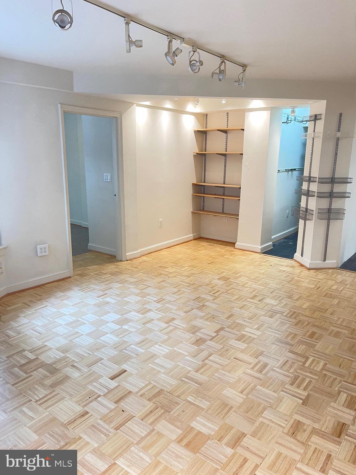 2500 Q Street Northwest, Unit 201 Washington, DC 20007 - Photo 21 of 36 a view of empty room with kitchen