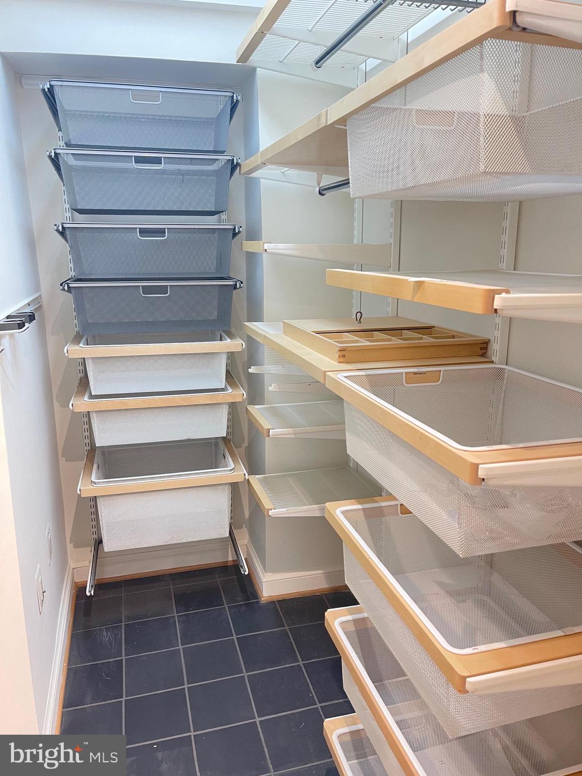 2500 Q Street Northwest, Unit 201 Washington, DC 20007 - Photo 23 of 36 a view of a room with shelves
