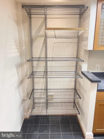 a view of a room with shelves