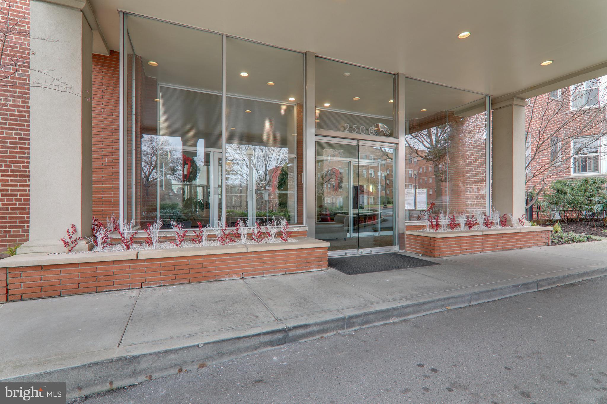 2500 Q Street Northwest, Unit 201 Washington, DC 20007 - Photo 3 of 36 a view of a building with a outdoor space