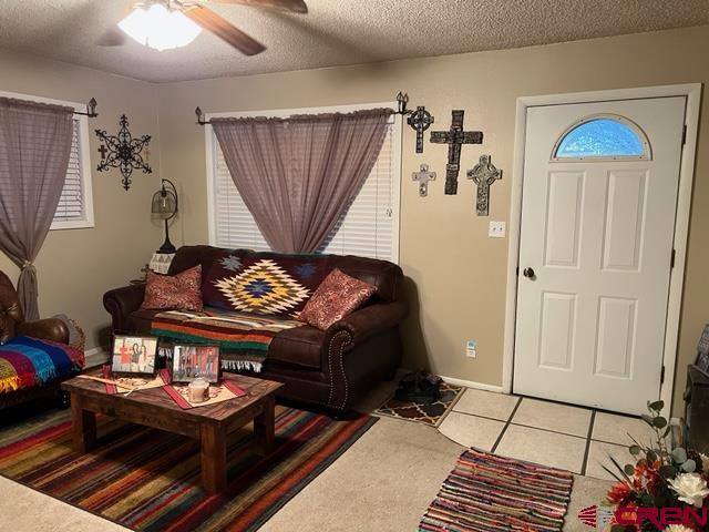 1726 Rolling Road Cortez, CO 81321 - Photo 4 of 15 a bedroom with furniture and a window