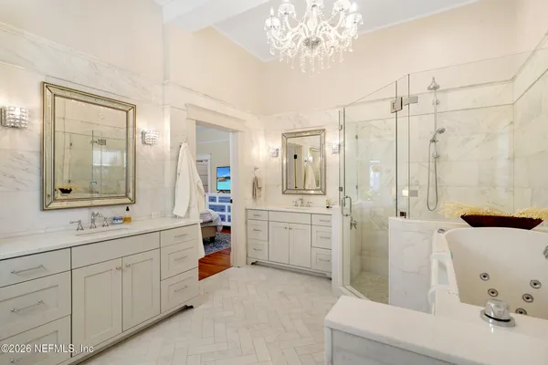 a bedroom with bed and window