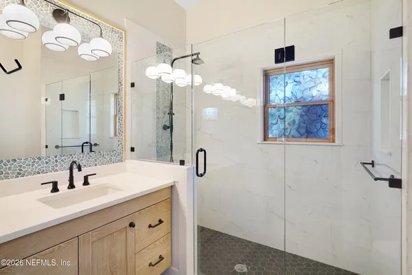 a view of balcony with furniture and city view