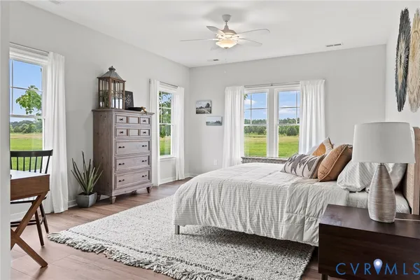 a bedroom with a bed furniture and a window
