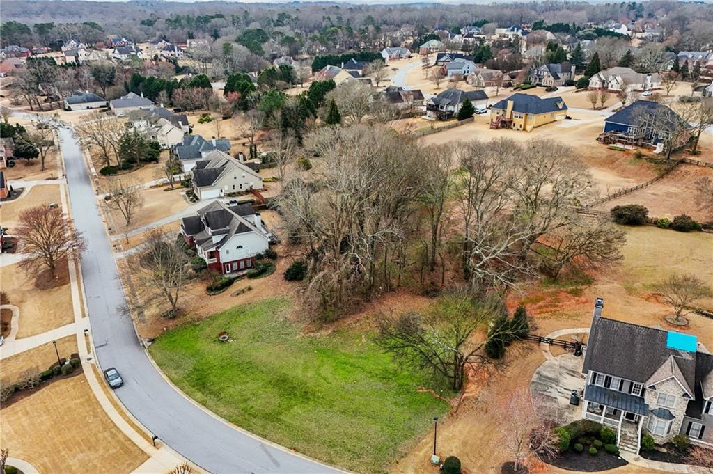 693 Reece Drive Hoschton, GA 30548 - Photo 11 of 16 an aerial view of residential houses with outdoor space