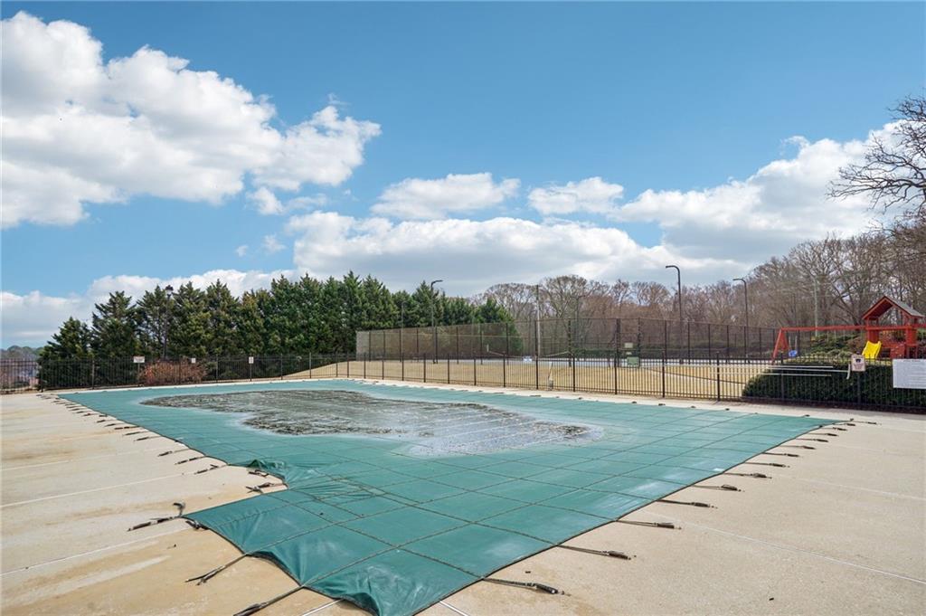693 Reece Drive Hoschton, GA 30548 - Photo 13 of 16 a view of outdoor space with playground