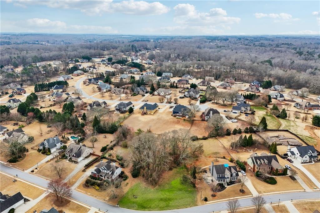 693 Reece Drive Hoschton, GA 30548 - Photo 8 of 16 an aerial view of residential houses with outdoor space