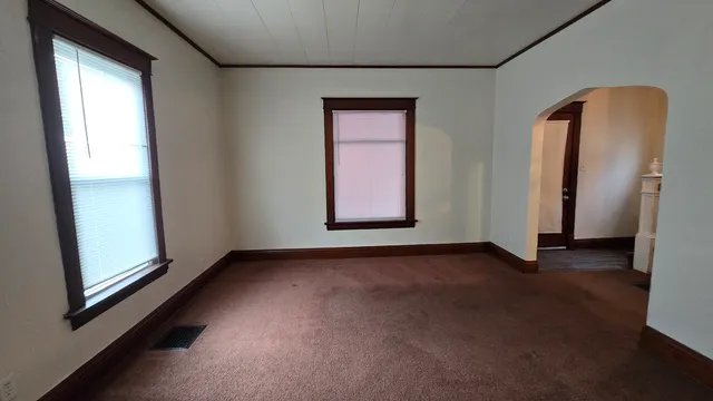 an empty room with windows