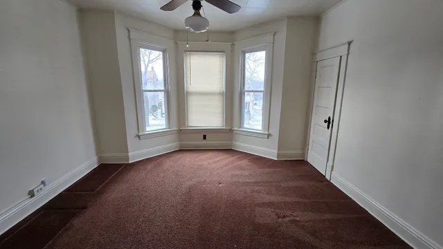 an empty room with a window