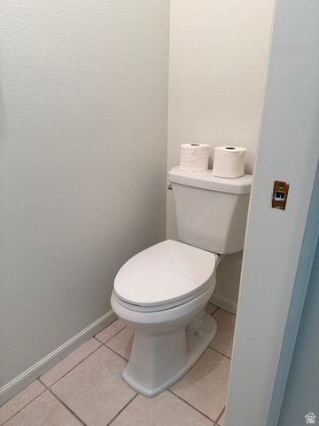 747 Hanover Drive Orem, UT 84058 - Photo 11 of 30 Bathroom with baseboards and light tile patterned flooring