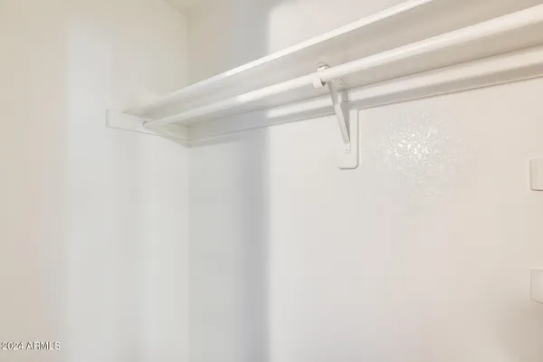 a bathroom with a sink toilet and mirror
