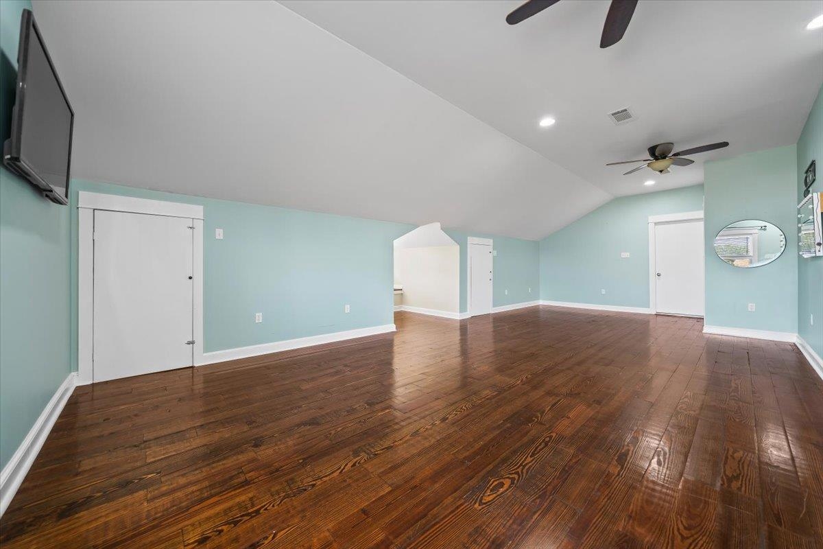 206 Deen Road Brighton, TN 38011 - Photo 25 of 35 Spacious room above garage featuring wood flooring.