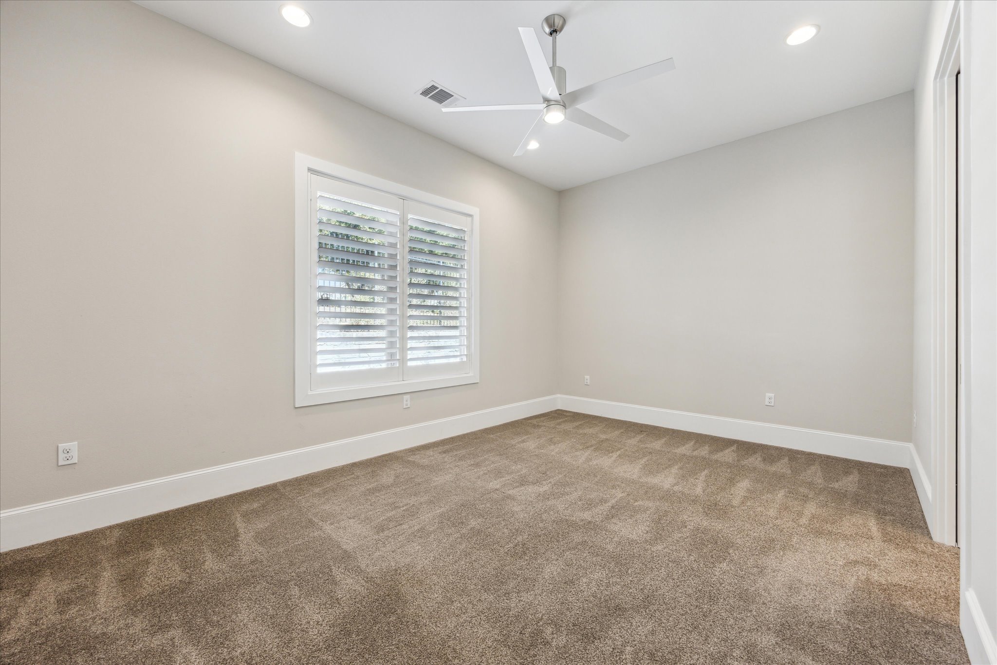 2604 Arion Circle Austin, TX 78730 - Photo 18 of 23 an empty room with a window