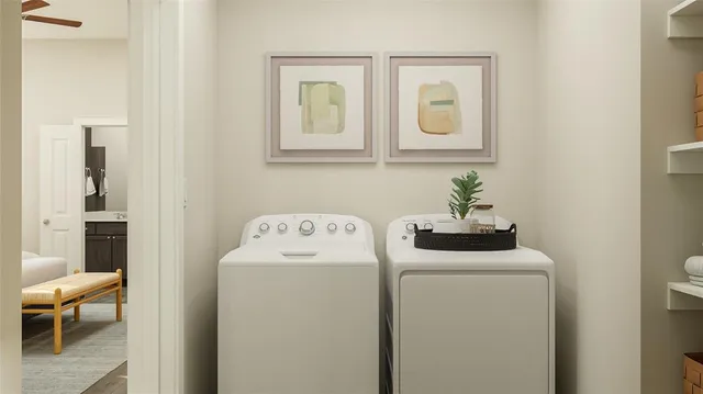 a utility room with dryer and washer