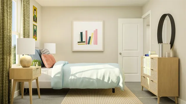 a bedroom with bed and window