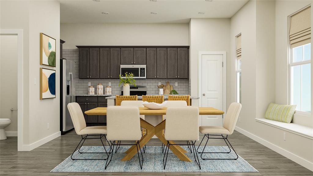 4314 Stonybrook Road Arlington, TX 76012 - Photo 4 of 22 a kitchen with a dining table chairs and refrigerator