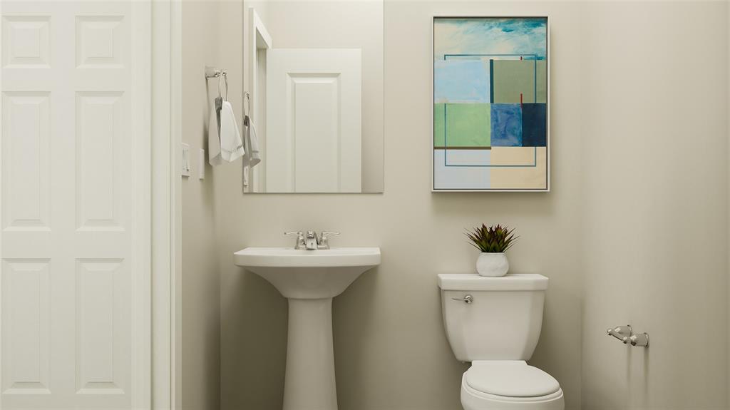 4314 Stonybrook Road Arlington, TX 76012 - Photo 7 of 22 a bathroom with a toilet sink and mirror