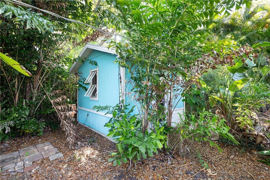 2424 Harbor Road Naples, FL 34104 - Photo 25 of 26 a view of a house with a tree