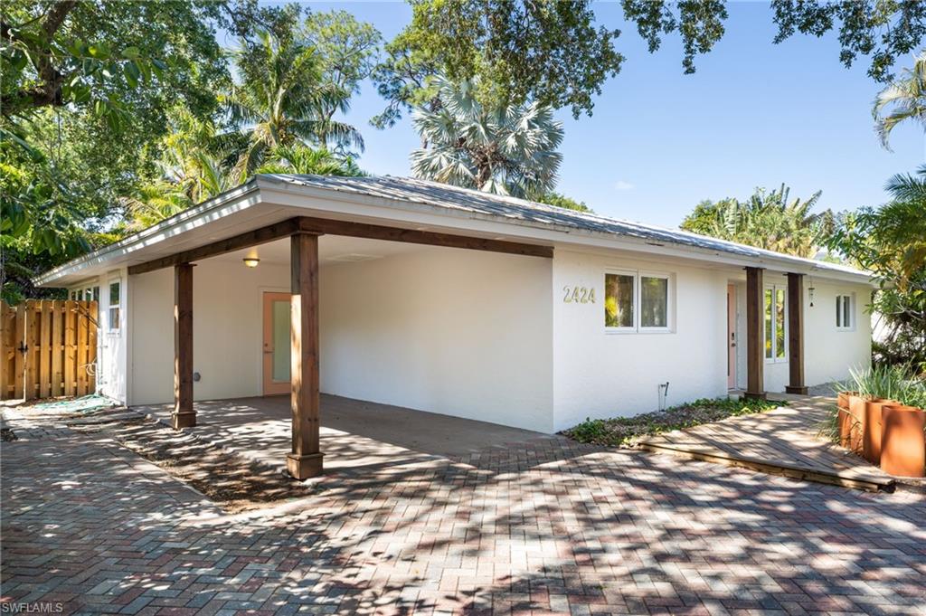 2424 Harbor Road Naples, FL 34104 - Photo 26 of 26 a house with a sink in the background