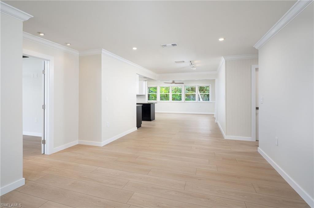 2424 Harbor Road Naples, FL 34104 - Photo 4 of 26 a view of an empty room with a window