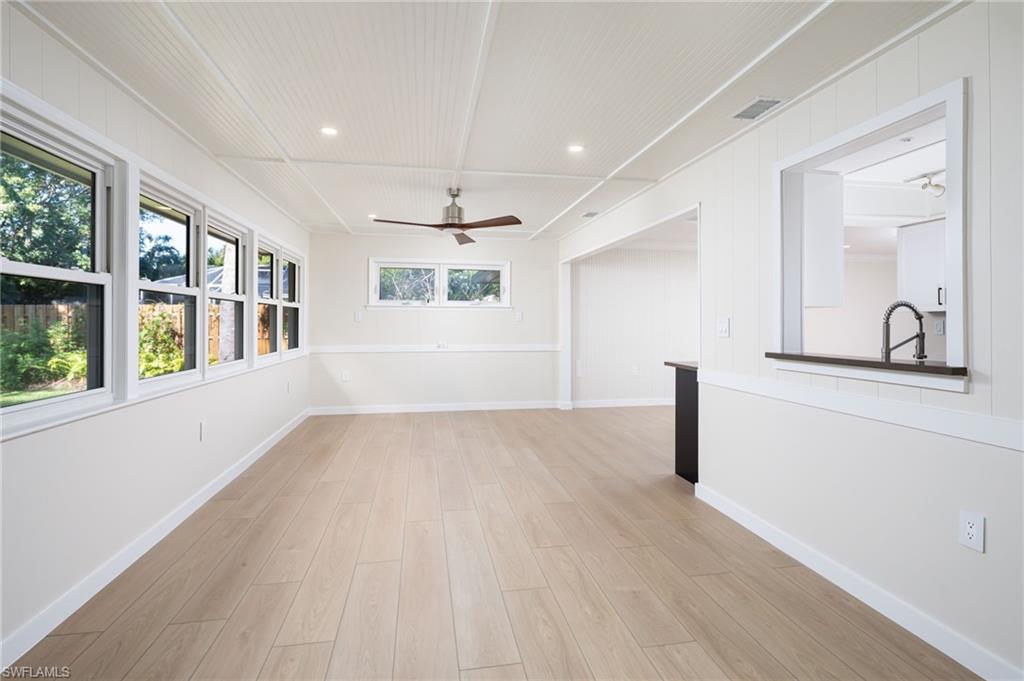 2424 Harbor Road Naples, FL 34104 - Photo 8 of 26 a view of an empty room with a window