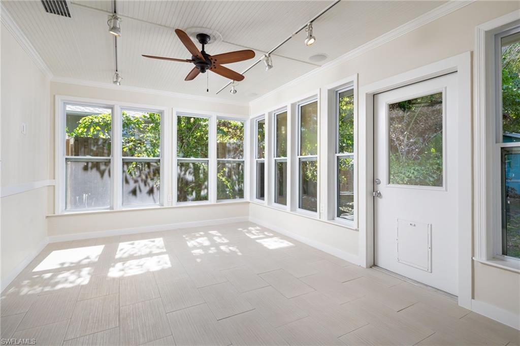 2424 Harbor Road Naples, FL 34104 - Photo 10 of 26 a view of an empty room with a window