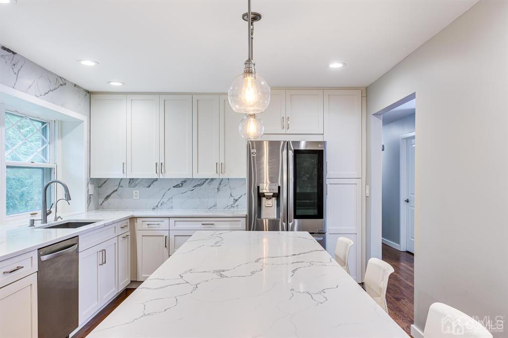 14 Tamarack Road Edison, NJ 08820 - Photo 14 of 40 a kitchen with a sink cabinets and window