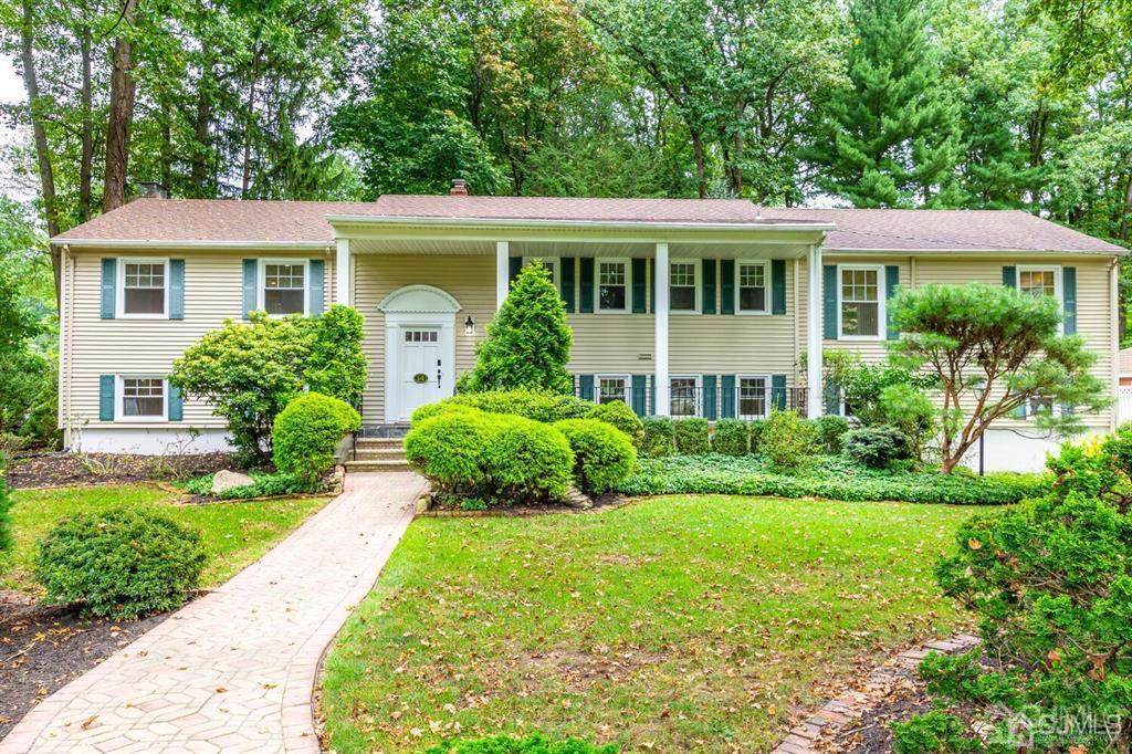 14 Tamarack Road Edison, NJ 08820 - Photo 2 of 40 a front view of a house with a yard