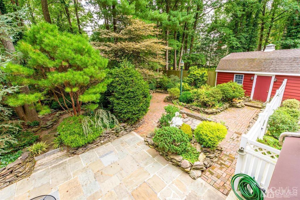 14 Tamarack Road Edison, NJ 08820 - Photo 21 of 40 a view of a garden with potted plants