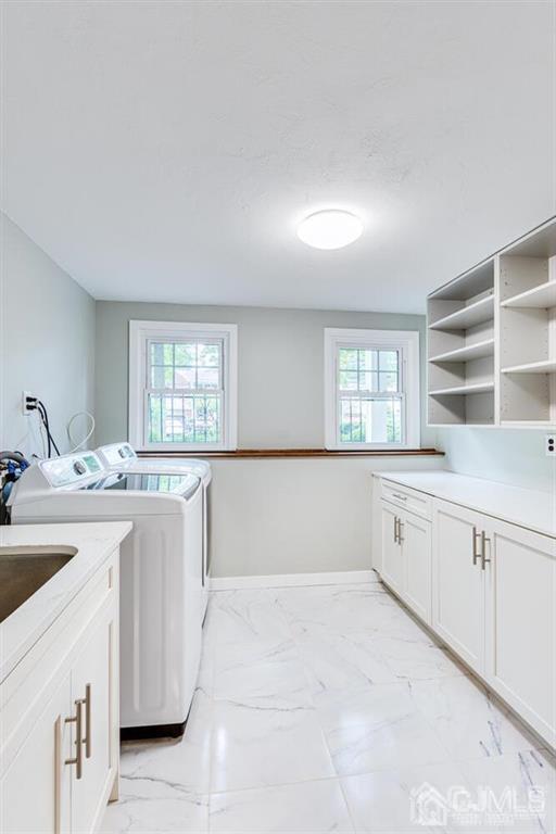 14 Tamarack Road Edison, NJ 08820 - Photo 31 of 40 a large white kitchen with cabinets and white appliances