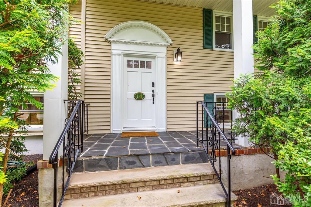 14 Tamarack Road Edison, NJ 08820 - Photo 4 of 40 a front view of a house with street