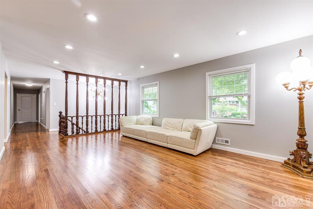 14 Tamarack Road Edison, NJ 08820 - Photo 8 of 40 a living room with furniture and wooden floor