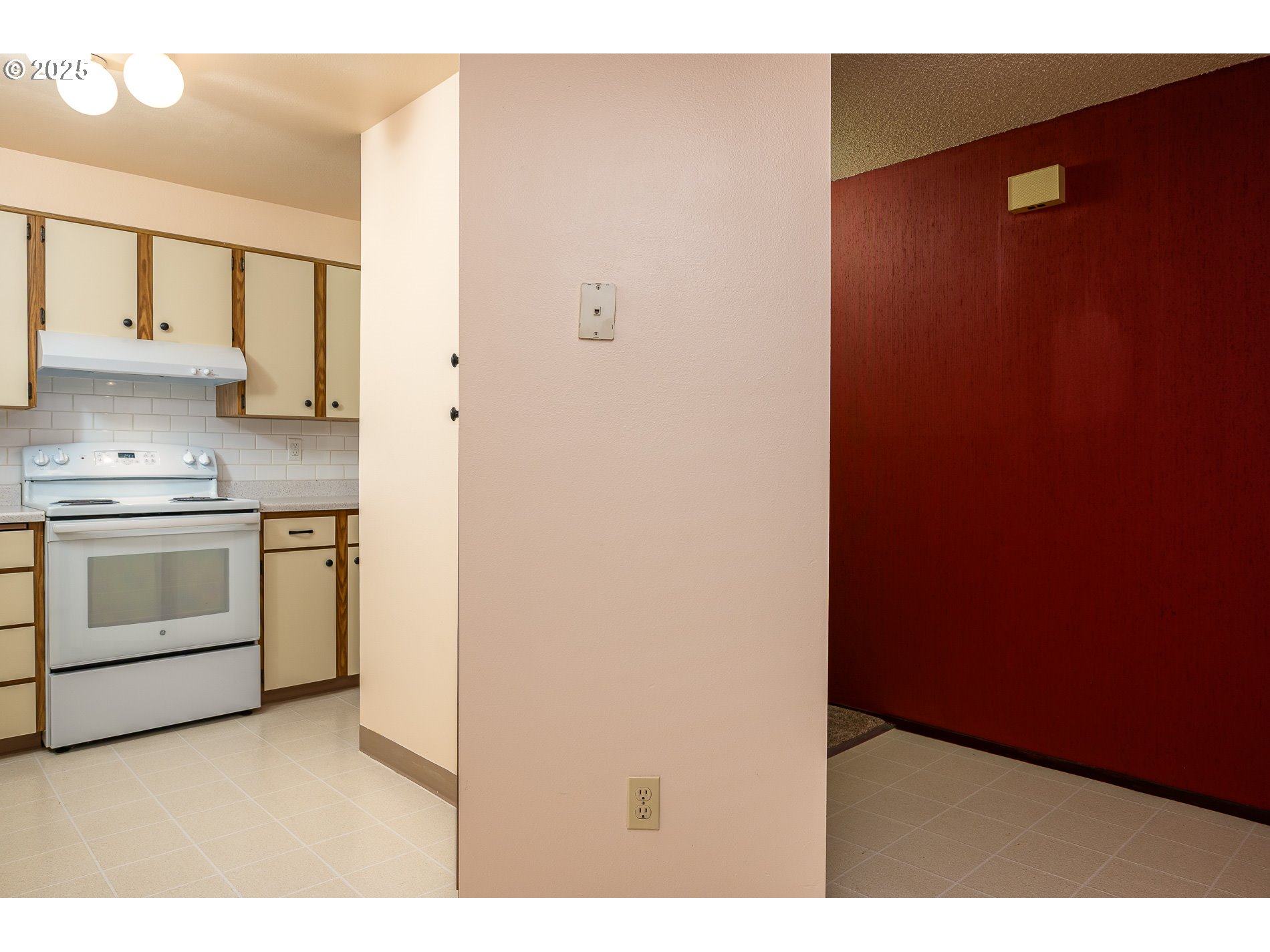 14828 Southwest 109th Avenue Portland, OR 97224 - Photo 12 of 40 a kitchen with white cabinets and white appliances