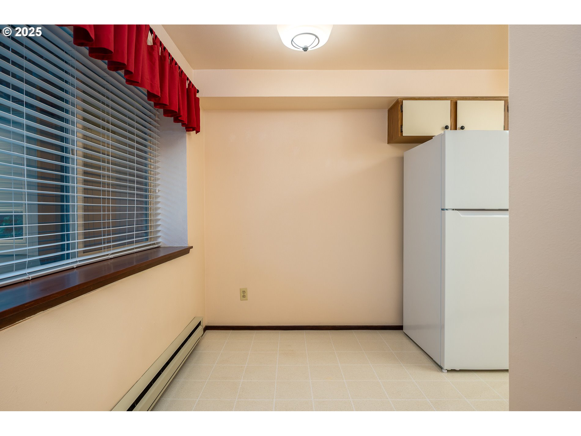 14828 Southwest 109th Avenue Portland, OR 97224 - Photo 13 of 40 a view of a room that has a window in it