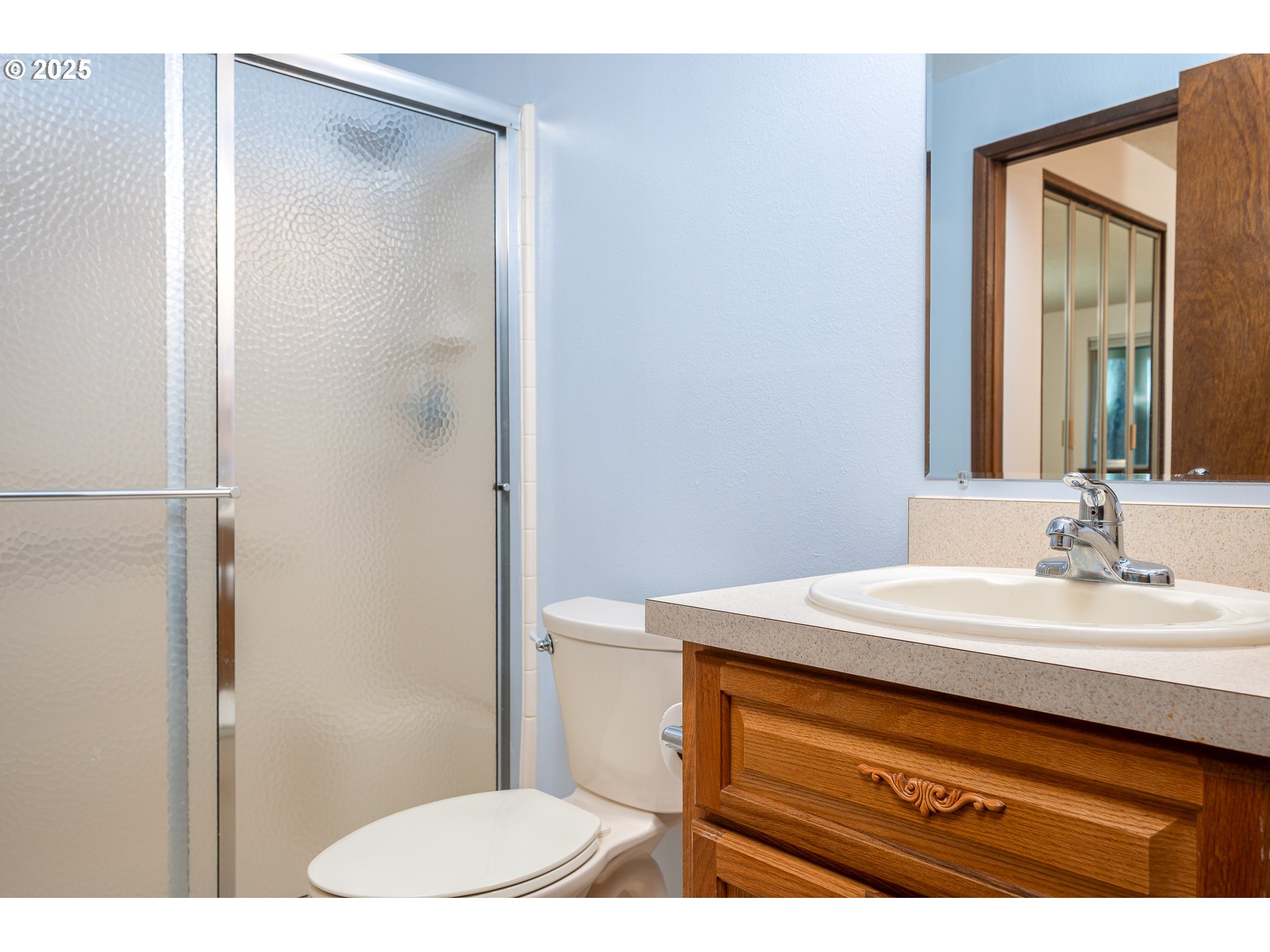 14828 Southwest 109th Avenue Portland, OR 97224 - Photo 30 of 40 a bathroom with a sink a toilet and shower