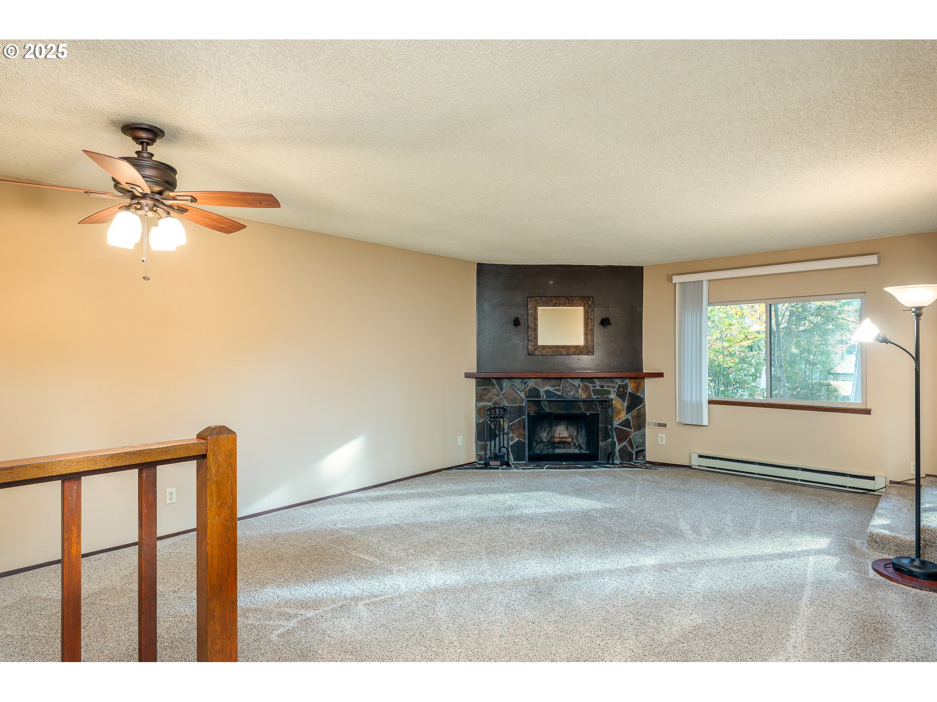 14828 Southwest 109th Avenue Portland, OR 97224 - Photo 7 of 40 a view of livingroom with furniture and a ceiling fan