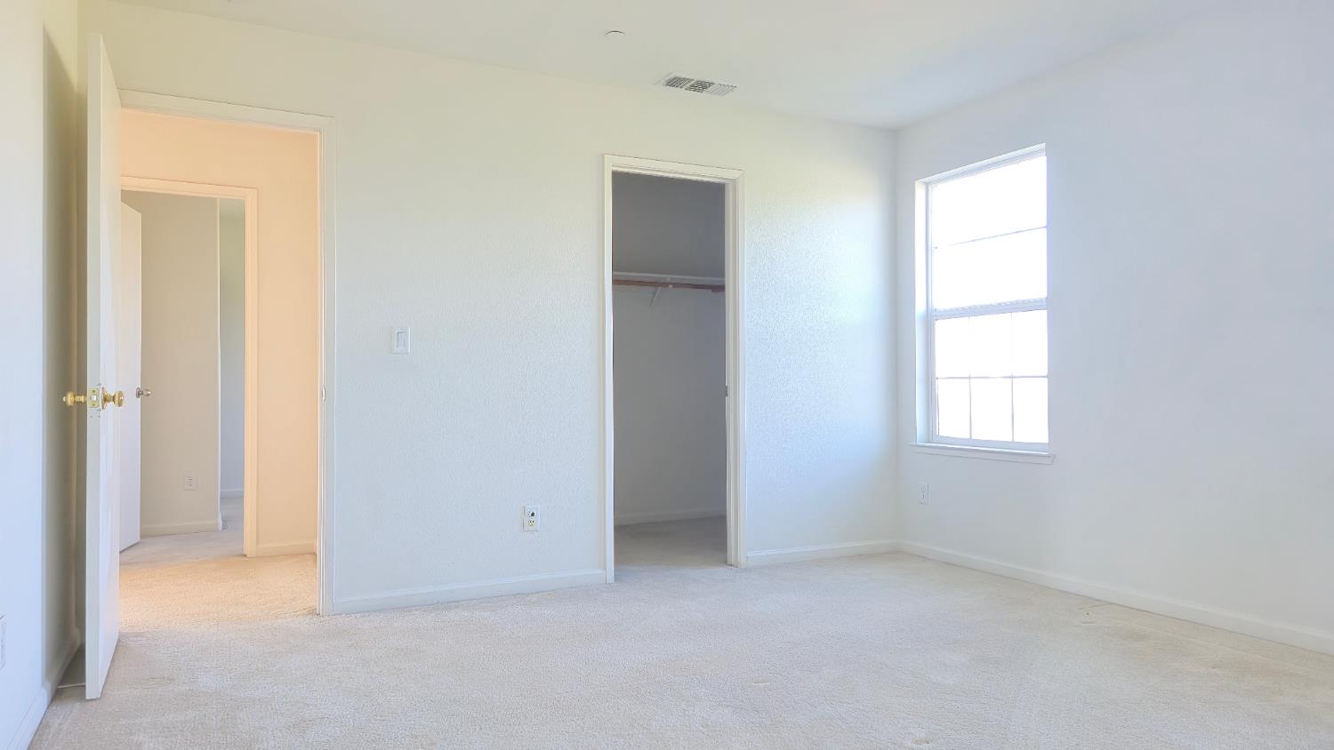 758 Persimmon Street Madera, CA 93638 - Photo 17 of 32 a view of an empty room with a window