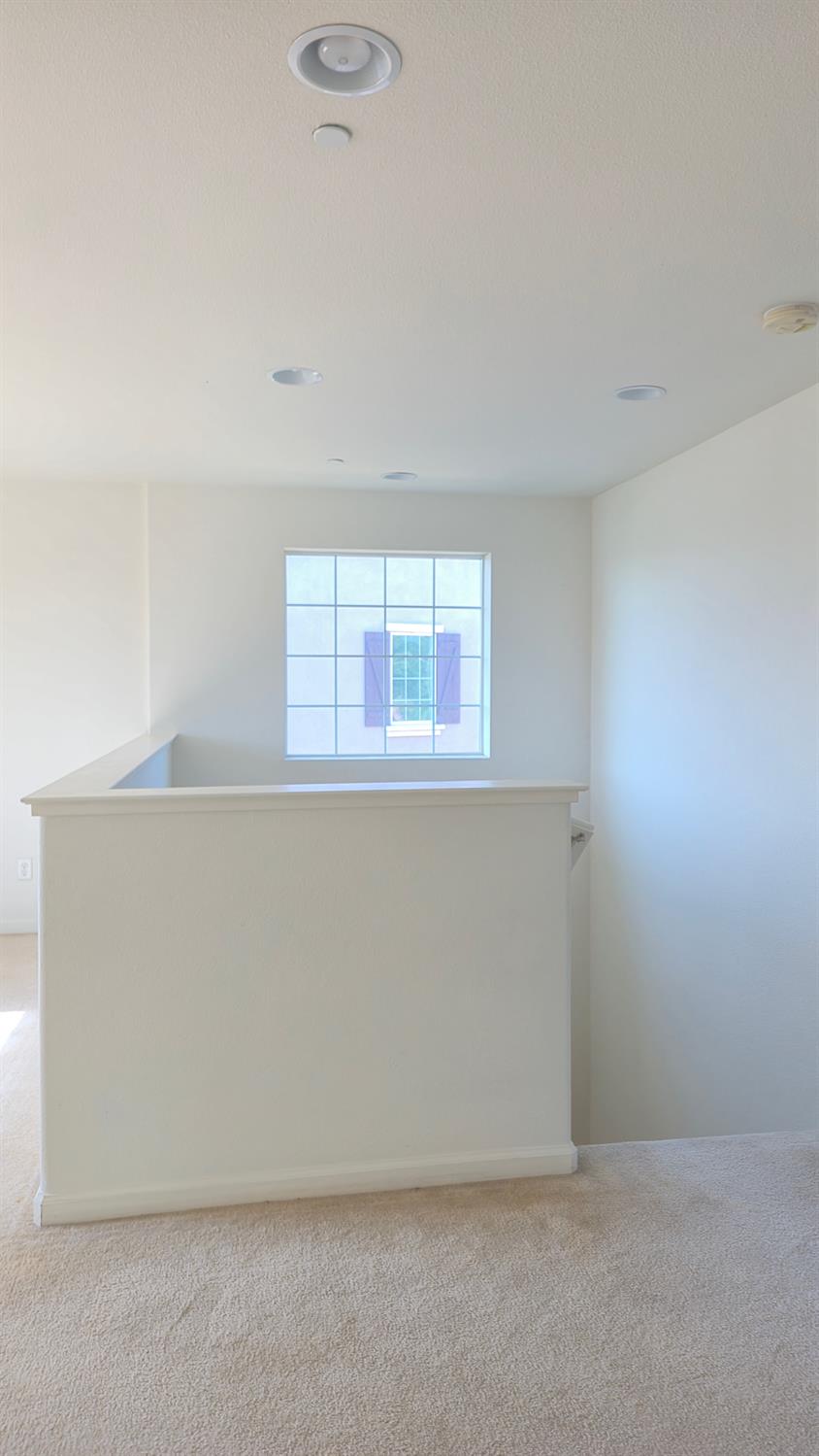 758 Persimmon Street Madera, CA 93638 - Photo 23 of 32 an empty room with a window