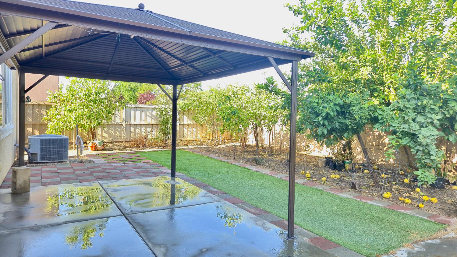 758 Persimmon Street Madera, CA 93638 - Photo 25 of 32 a view of yard with tree