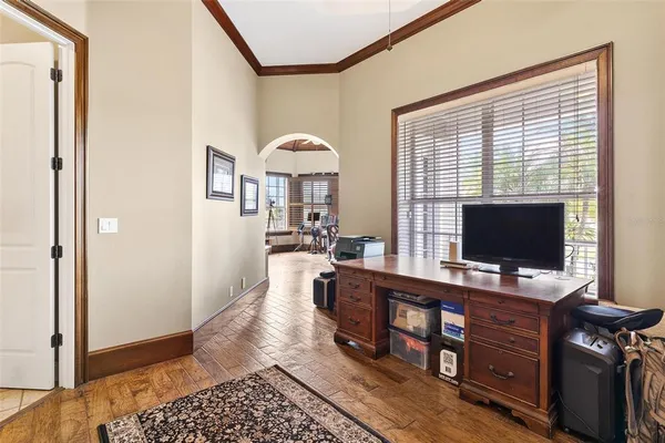 a view of a porch with wooden floor