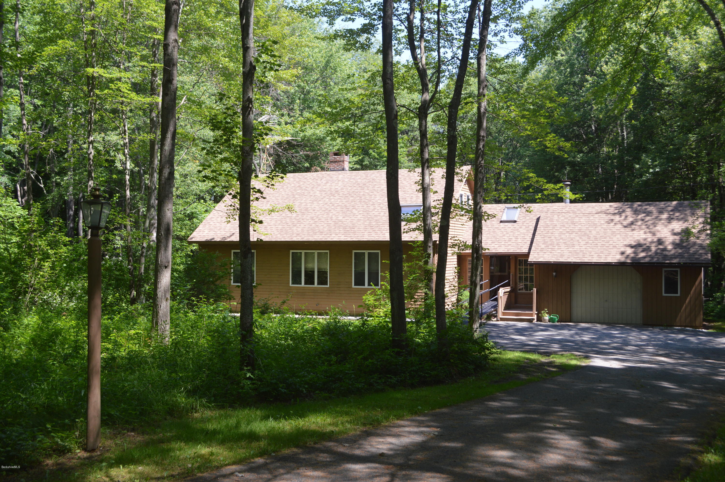 453 Summit Road Richmond, MA 01254 - Photo 1 of 25 a view of a house with backyard and garden