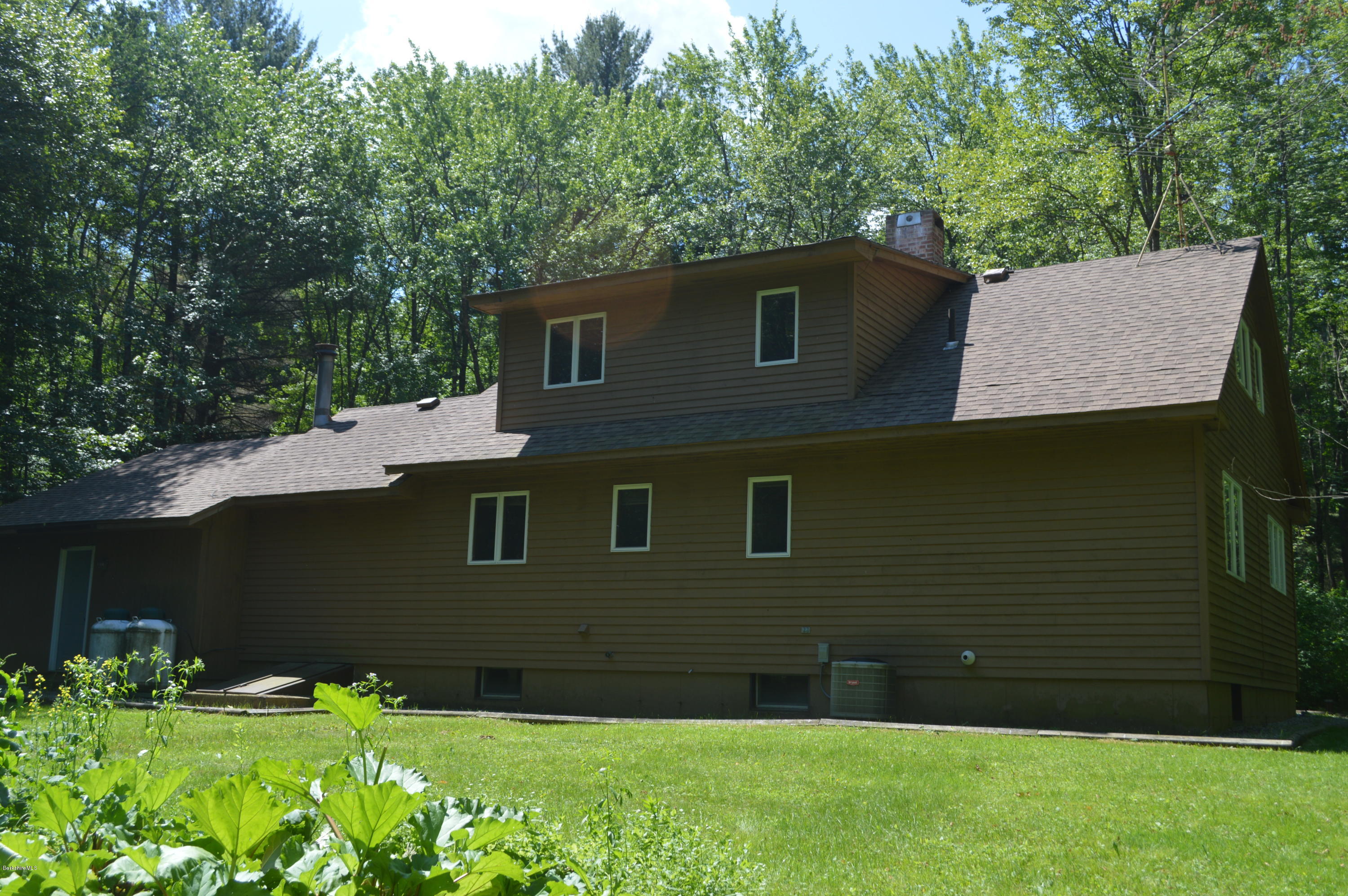 453 Summit Road Richmond, MA 01254 - Photo 22 of 25 a view of house with backyard