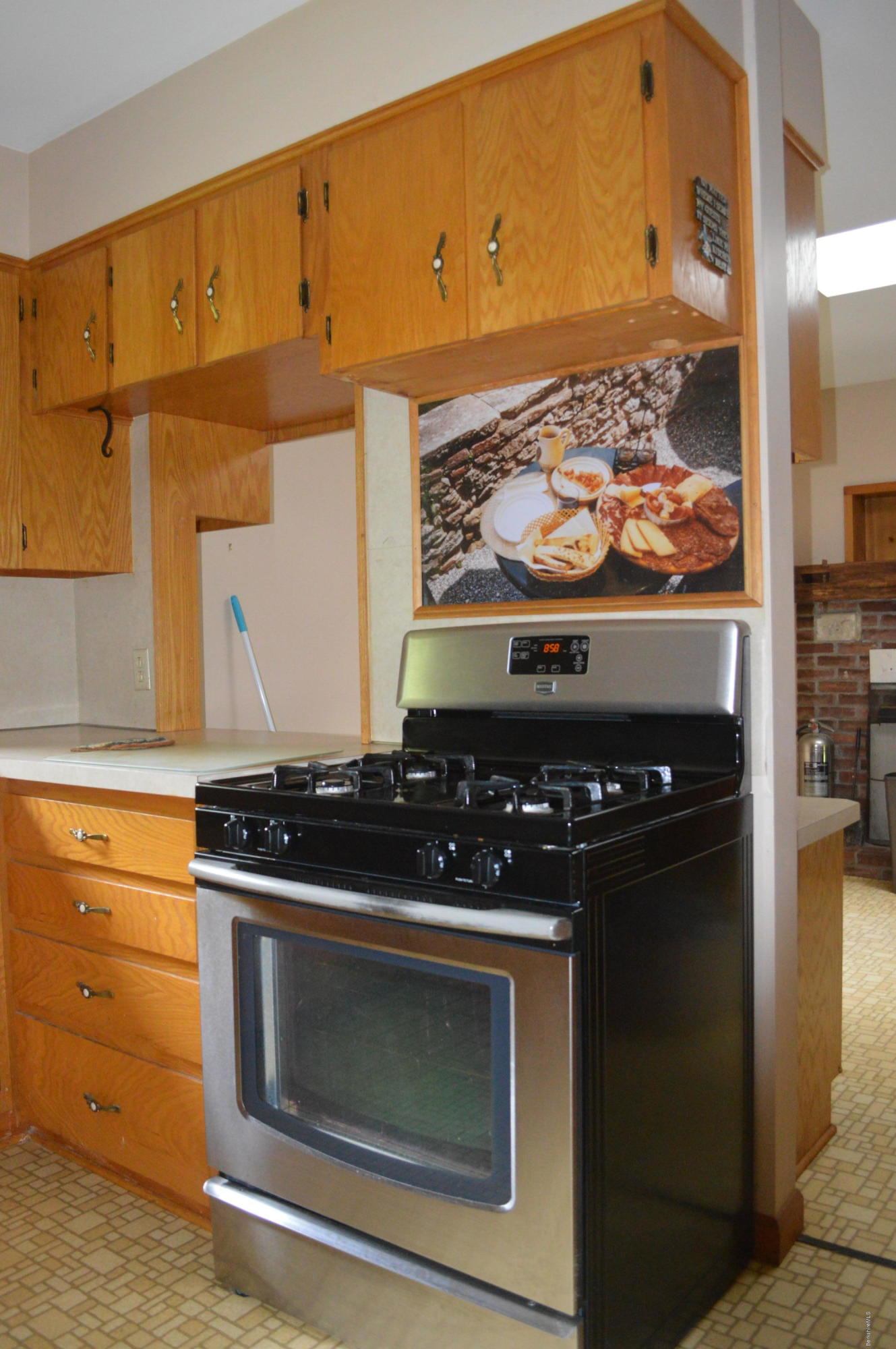453 Summit Road Richmond, MA 01254 - Photo 8 of 25 a stove top oven sitting inside of a kitchen