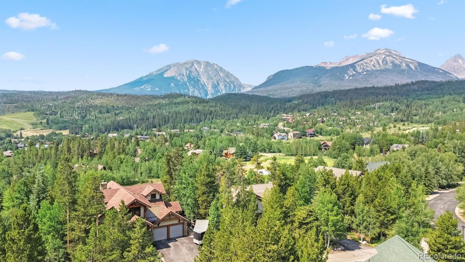 1730 Red Hawk Road Silverthorne, CO 80498 - Photo 38 of 50 a view of a house with a yard and a large tree