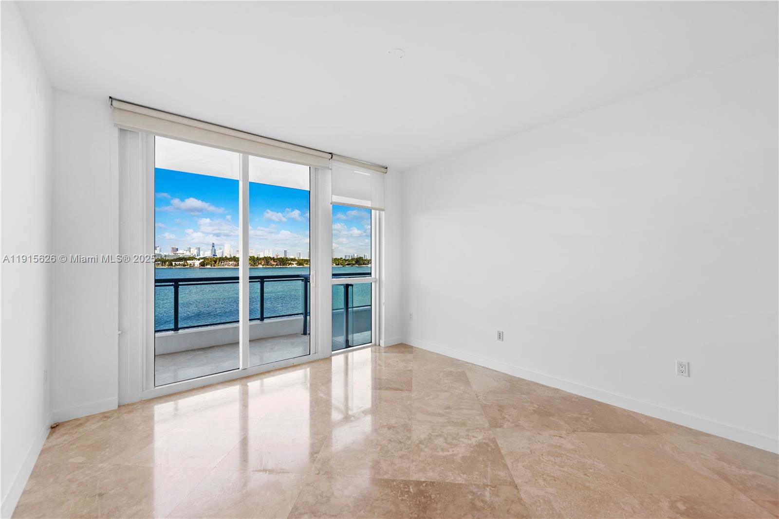 540 West Avenue, Unit 413 Miami Beach, FL 33139 - Photo 18 of 33 an empty room with sliding door