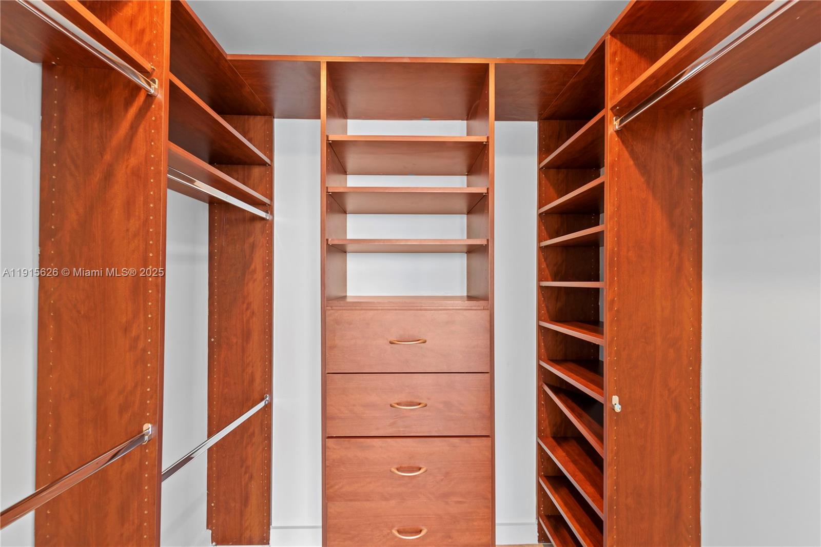540 West Avenue, Unit 413 Miami Beach, FL 33139 - Photo 21 of 33 a view of walk in closet with empty racks