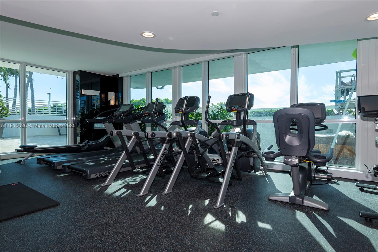 540 West Avenue, Unit 413 Miami Beach, FL 33139 - Photo 28 of 33 a room with gym equipment and a large window