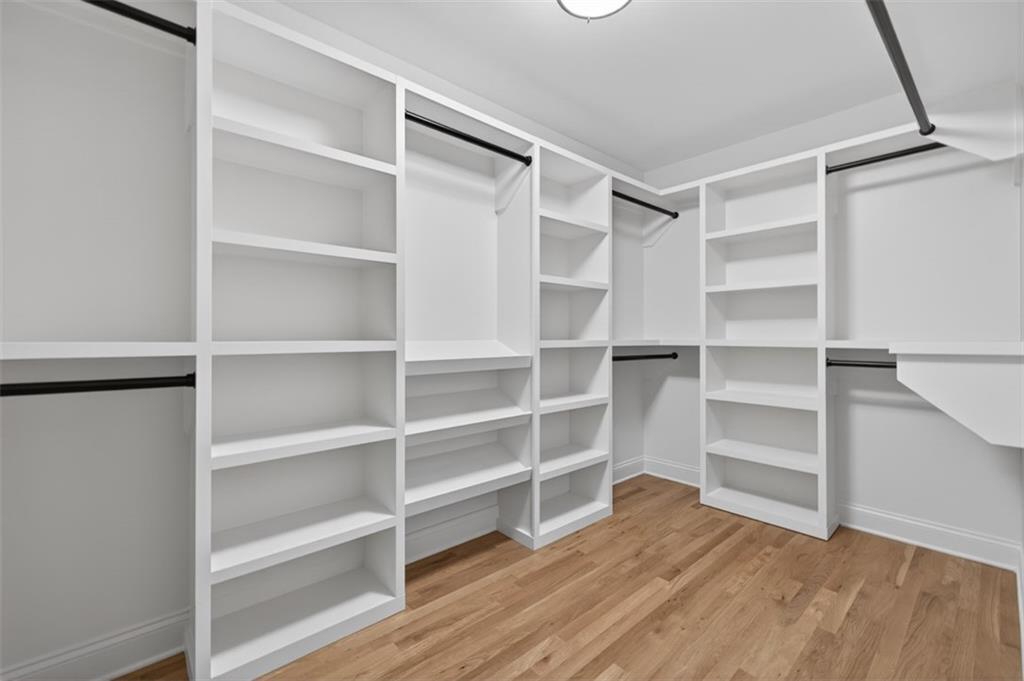 3110 Flatbottom Road Ball Ground, GA 30107 - Photo 38 of 89 a view of walk in closet with empty racks